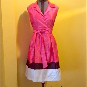 Sleeveless, t-length dress with silk finish